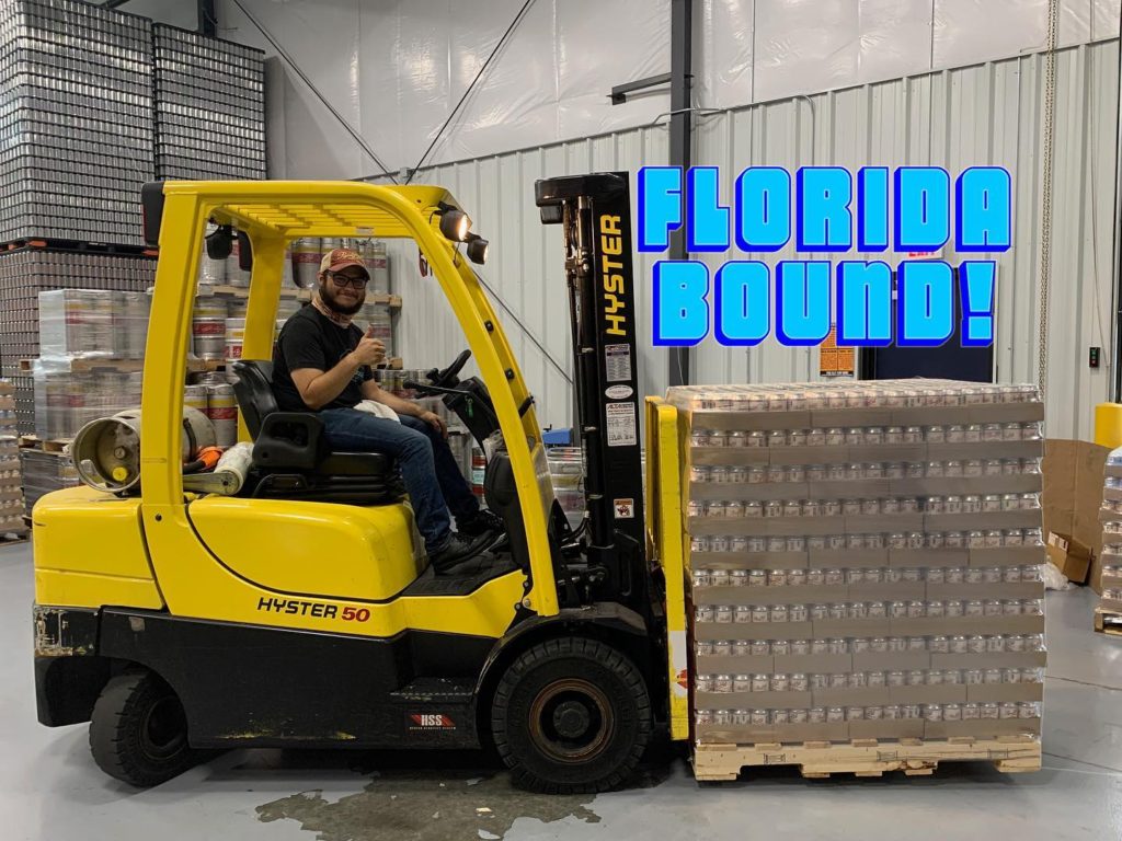 Pigeon Hill is Florida Bound. Man on forklift with "Florida Bound" in  text.